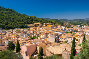 Fototapeta na wymiar A view on Capdepera town from the castle on a sunny day on Mallorca island in Spain