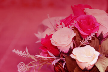 Romantic background, red pink rose bouquet with free space for text.