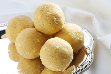 Special Laddoo, Indian Sweets Fresh Ladoo, Roasted gram flour mixed with Desi Ghee and sugar to make tasty and round shape sweet Laddu