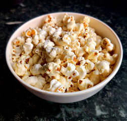 popcorn in a bowl. bowl of popcorn.