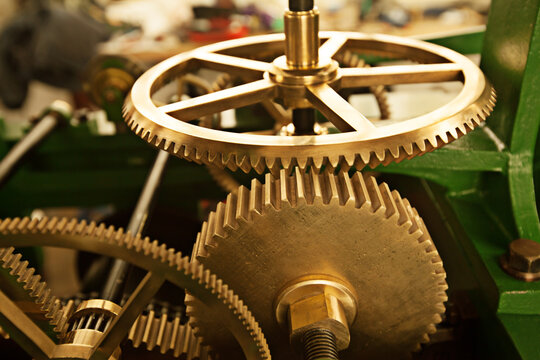 Horologists idea of a good time. Top view of toothed gears of a tower clock.