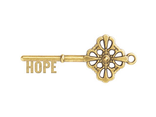 Bronze vintage antique keys with word Hope isolated on white background