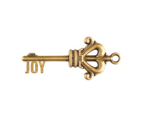 Bronze vintage antique keys with word JOY isolated on white background