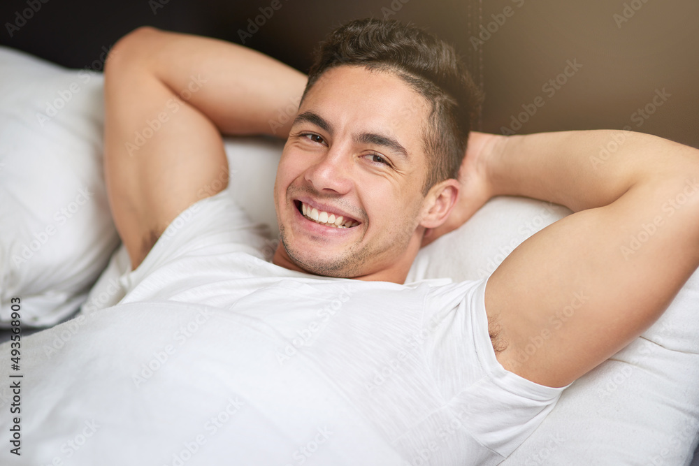 Poster My bedroom is my favorite place. Cropped shot of a handsome young man lying in bed.