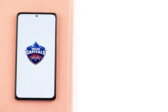 West Bangal, India - March 18, 2022 : Delhi Capitals Logo On Phone Screen Stock Image.