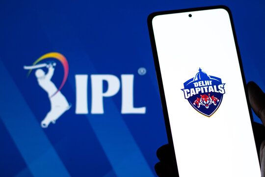West Bangal, India - March 18, 2022 : Delhi Capitals logo on phone screen stock image.