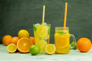 Fototapeta na wymiar Fresh citrus lemonade with mint on a rustic background