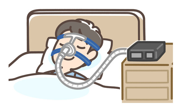 CPAPをつけて寝ている男性