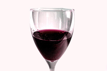 Glass with red wine isolated on white background.