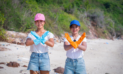 Asian women in summer dresses ,hat and color gloves with her arms crossed in front of her chest...