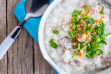 Breakfast rice porridge on a wooden table