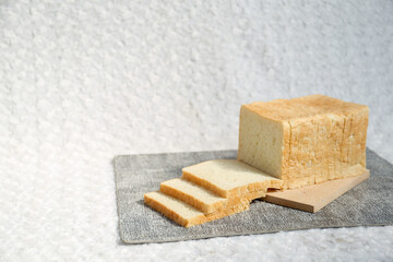 Plain toasted bread whole. White bread toast slice.