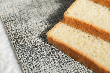 Plain toasted bread whole. White bread toast slice.