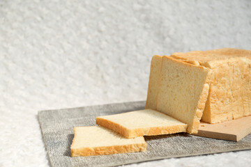 Plain toasted bread whole. White bread toast slice.