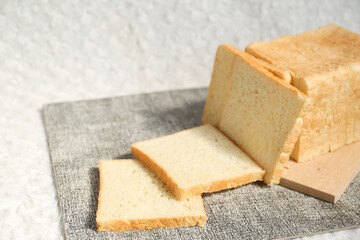 Plain toasted bread whole. White bread toast slice.