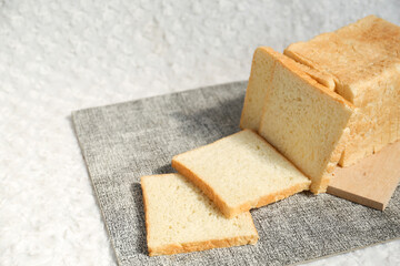 Plain toasted bread whole. White bread toast slice.