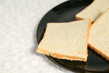 Plain toasted bread whole. White bread toast slice.