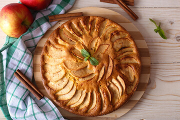 Appetizing pie close-up on a wooden background