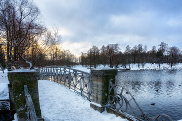 Bridges in a snow-covered winter park in Gatchina, Leningrad region, Russia