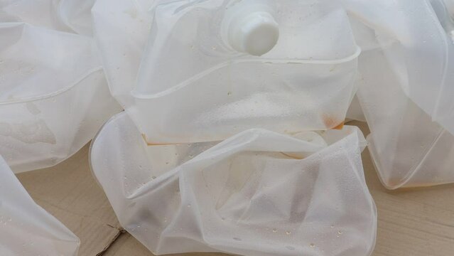 Garbage bags and plastic containers contaminated with chemicals