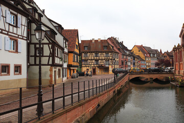 Fototapeta na wymiar Colorful houses in the streets of Colmar, Alsace, France
