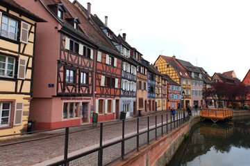 Fototapeta na wymiar Colorful houses in the streets of Colmar, Alsace, France