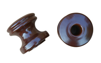 Ceramic strain spool insulator, electric clamp on white background