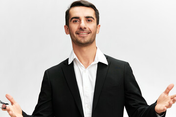 smiling friendly business man raising his hands gas mask in black suit boss employer isolated background Copy space