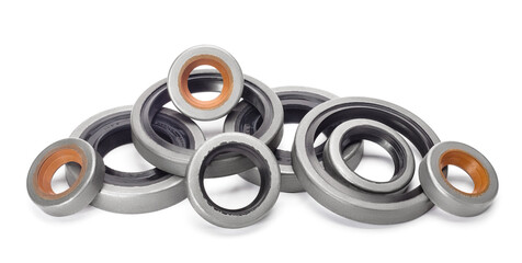 Rubber reinforced oil seals for shafts and for car motor engines, isolated on white background....