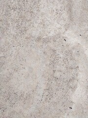 The concrete wall has a unique pattern that is perfect for a vintage design.