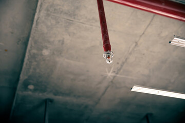 Close-up fire sprinkler on the ceiling for fire detection and alarm system equipment in building...