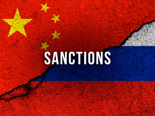China sanctions against Russia. Country flags together painted on cracked concrete wall background...