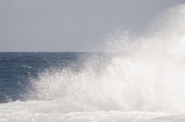 Fototapeta premium Wave breaking against the shore. El Confital. La Isleta Protected Landscape. Las Palmas de Gran Canaria. Gran Canaria. Canary Islands. Spain.