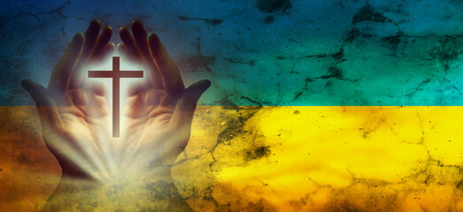 Hands in prayer. Prayer for Ukraine. Ukrainian flag. Prayer for the whole world