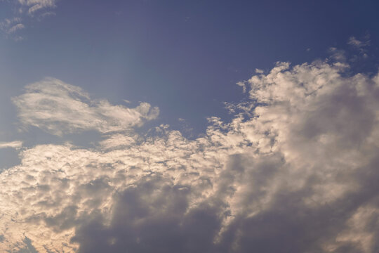 blue sky with clouds, sunlight in clouds in the sky, clouds - sky background © PK