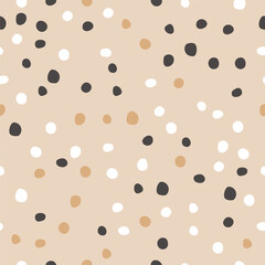Polka dot seamless pattern with round hand drawn shapes