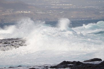 Waves breaking against the shore. El Confital. La Isleta Protected Landscape. Las Palmas de Gran Canaria. Gran Canaria. Canary Islands. Spain.