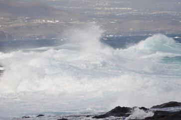 Waves breaking against the shore. El Confital. La Isleta Protected Landscape. Las Palmas de Gran Canaria. Gran Canaria. Canary Islands. Spain.