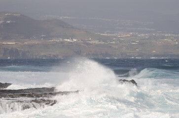 Waves breaking against the shore. El Confital. La Isleta Protected Landscape. Las Palmas de Gran Canaria. Gran Canaria. Canary Islands. Spain.