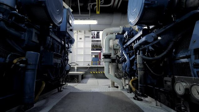 Between diesel generators in engine room of ship