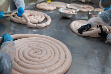 Fototapeta na wymiar production of sausages and frankfurters. farm sausages