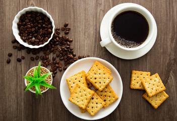 Flat lay of breakfast table with biscuit and coffee