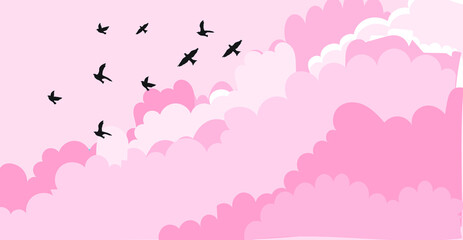 birds flying in the pink sky
