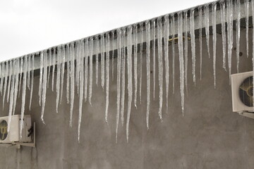 icicles hanging from a roof