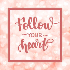 Follow your heart. Motivational and inspirational handwritten lettering on blurred bokeh background with hearts. illustration for posters, cards and much more