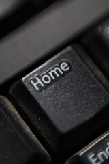 close up shot of a keyboard home key with selective focus shallow depth of field