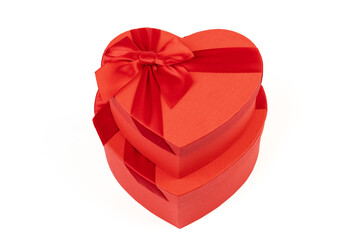 Red box in shape of heart. Gift box for Valentine's Day. Isolated on white background.