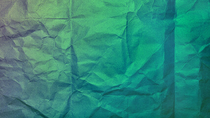 Tinted texture of kraft crumpled green-blue paper closeup.