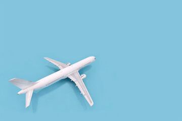 Three-dimensional model of a white plane on a blue background, 3d rendering