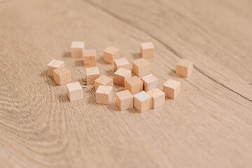 Fototapeta na wymiar Montessori school. wooden cubes for learning mathematics. alternative education